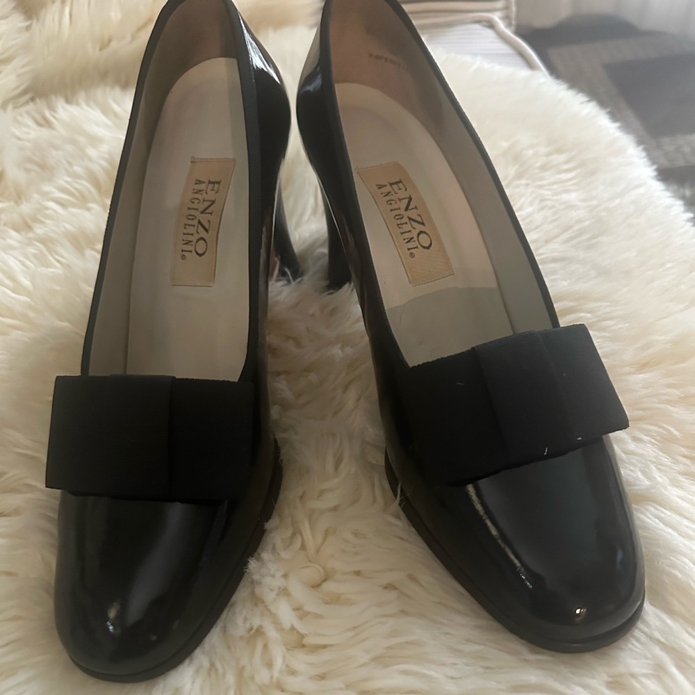 Black patent heels with grosgrain bow. Enzo Angiolini